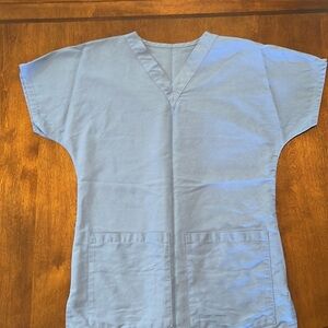 Lot of 4 total blue scrub tops. 2 front pockets Size XS